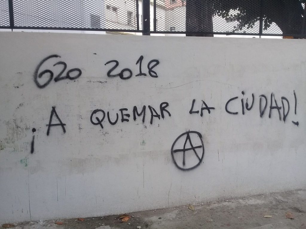 "G20 2018 - Burn the city" Graffiti on a wall in Buenos Aires, made in the days leading up to the G20 summit in Argentina. Photo by Cambalachero.